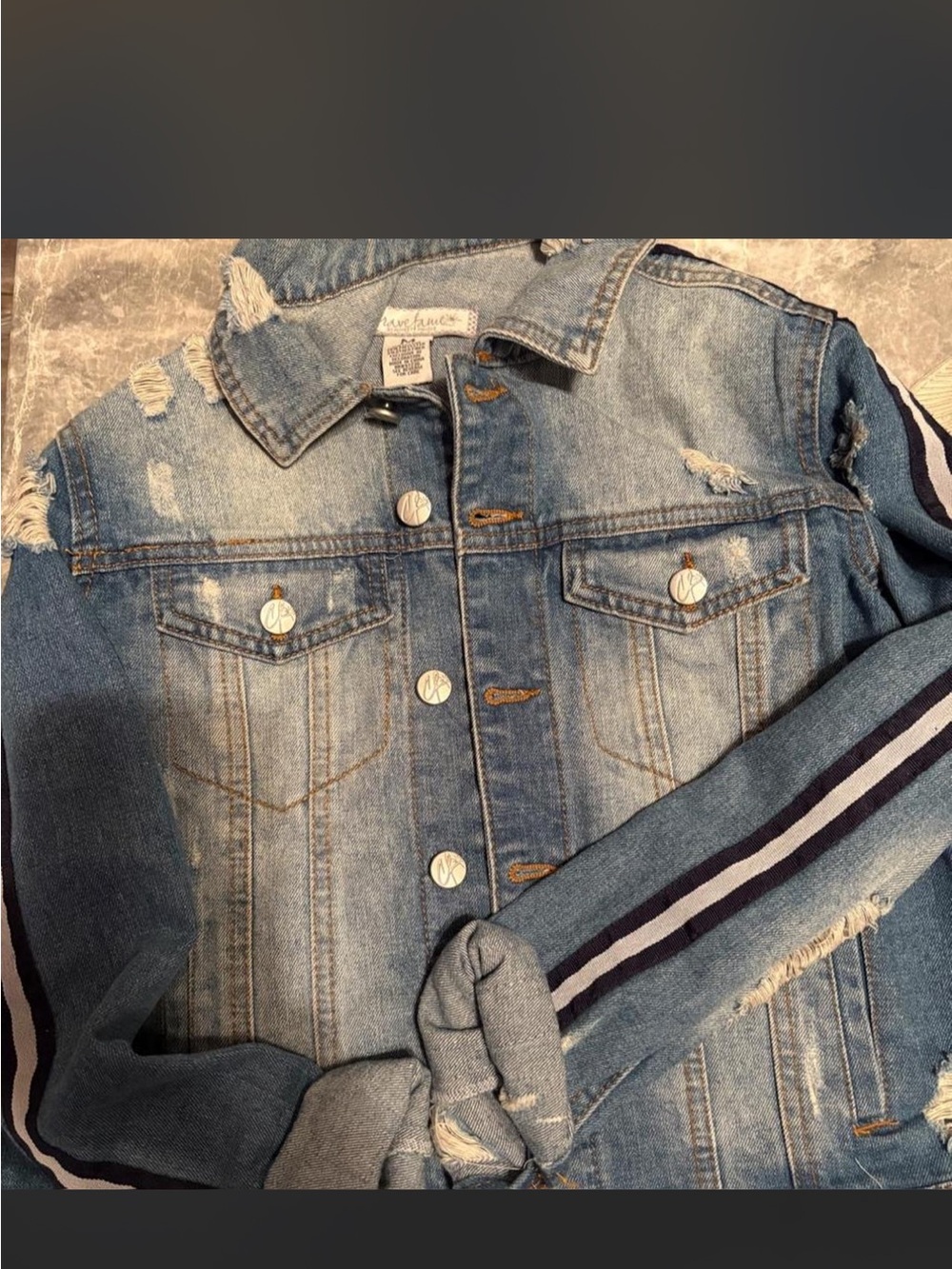 Blue denim jacket with white and black stripes on sleeves, size M